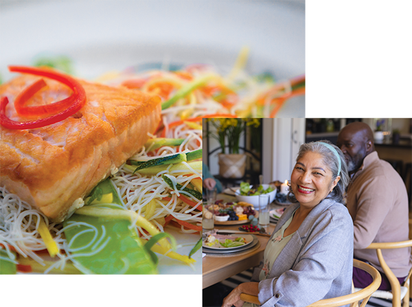 senior couple smiling while having lunch