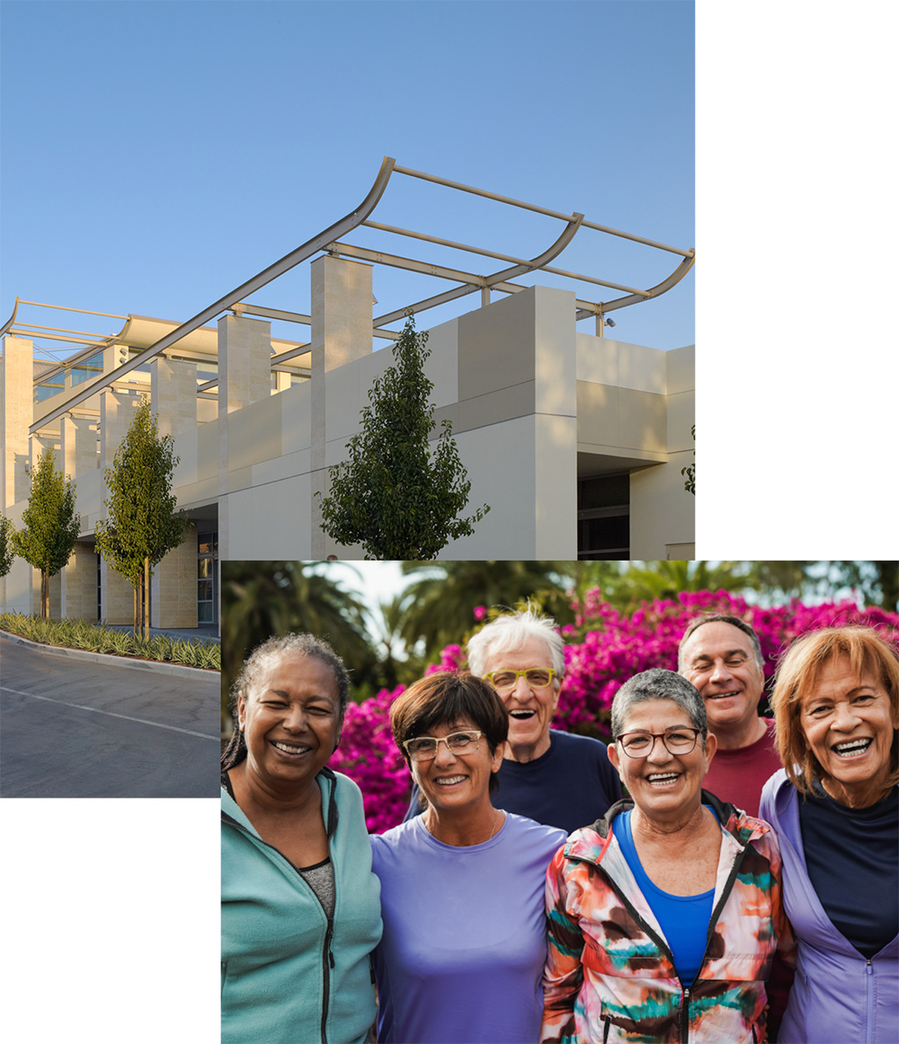 group of seniors smiling outside museum